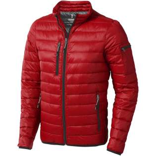 The Scotia men's lightweight down jacket – the ultimate fusion of style and comfort. This jacket features elasticated binding on the bottom and sleeves, offering a comfortable and slightly tight fit that adds protection against chilly winds. The outer shell fabric is made of nylon dull cire 20D woven with a water-repellent finish, ensuring exceptional durability. The lightweight material allows for easy movement and effortless wear throughout the day. The downproof pressed fabric prevents the down and feathers from escaping, ensuring long-lasting warmth and an extra level of durability. The down insulation is RDS certified (Responsible Down Standard), consisting of down and feathers, providing lightweight warmth without compromising ethical standards. A reliable companion for any outdoor adventure.