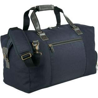 Exhibit your powerhouse style with the Capitol Collection, a blend of classic and contemporary design. Standard features include large main zipped compartment, dedicated zipped shoe pocket, and front zipped pocket for additional storage. Detachable, adjustable padded strap and carrying handles for ease of travel. Imitation leather accents and antique hardware.