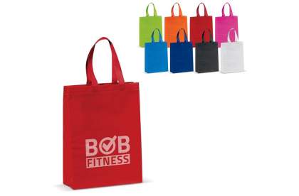 Non-woven bag in various colours. Matt laminated. The handles are made of non-woven material. Ideal for groceries or a day at the beach. Also appropriate for business conferences.