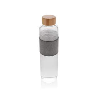 Geen plastic waterflessen meer kopen in de winkel, maar uw eigen duurzame fles uit de Impact Collectie hergebruiken. Door gebruik te maken van duurzame glas- en roestvrijstalen materialen verbetert u de herbruikbaarheid van producten ten opzichte van producten voor eenmalig gebruik. Met de focus op water wordt 2% van de opbrengst van elk verkocht Impact product gedoneerd aan Water.org.Deze glazen fles met bamboe deksel ondersteunt uw duurzame levensstijl en vermindert uw plastic afval en verbetert uw hydratatiegewoonten. Gemaakt van hoogwaardig borosilicaatglas, bestand tegen grote temperatuurveranderingen. Een prachtige sleeve maakt de look af. Capaciteit 750ml. BPA-vrij. Geen plastic waterflessen meer kopen in de winkel, maar uw eigen duurzame fles uit de Impact Collectie hergebruiken. Door gebruik te maken van duurzame glas- en roestvrijstalen materialen verbetert u de herbruikbaarheid van producten ten opzichte van producten voor eenmalig gebruik. Met de focus op water wordt 2% van de opbrengst van elk verkocht Impact product gedoneerd aan Water.org.Deze glazen fles met bamboe deksel ondersteunt uw duurzame levensstijl en vermindert uw plastic afval en verbetert uw hydratatiegewoonten. Gemaakt van hoogwaardig borosilicaatglas, bestand tegen grote temperatuurveranderingen. Een prachtige sleeve maakt de look af. Capaciteit 750ml. BPA-vrij.