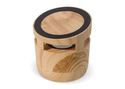 Wooden look speaker with a luxurious design and excellent sound quality. The unique 2-in-1 speaker also functions as a wireless charging station. By placing your smart phone on top of the speaker, it will simultaneously play music while charging the phone wirelessly. Comes packaged in a luxurious gift box. Cable and manual included.