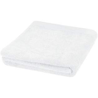 High quality and sustainable 550 g/m² towel that is delightfully thick, silky, and super soft to the skin. This item is certified STANDARD 100 by OEKO-TEX®. It guarantees that the textile product has been manufactured using sustainable processes under environmentally friendly and socially responsible working conditions and is free from harmful chemicals or synthetic materials. Available in a variety of beautiful colours to refine any home or hotel bathroom. The towel is dyed with a waterless dyeing process that reduces freshwater demand and prevents the large volumes of polluted water that are typical of water-based dyeing processes. Towel size: 100x180 cm. Made in Europe. 