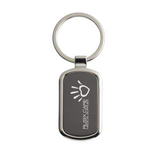 A rectangular, polished, nickel metal keyring with black inlay and sturdy keyring. Each item is individually boxed.