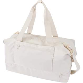The Trip Aware™ recycled travel duffel bag is a versatile and spacious companion, ideal for short getaways and carrying all your essentials with ease. Made from durable 290D twill polyester with a soft knitted backing and lined with RPET 210D/PU, it is designed for practical use and comfort. The main compartment includes a large zipped pocket with dedicated storage for a passport, pens, and a key ribbon, along with two internal slide pockets and dual water bottle holders. A separate bottom compartment opens in a clamshell style, perfect for storing shoes or separating gear. Each bag also comes with an Aware™ tracer. This innovative feature allows users to trace the origins and journey of their item through a QR code, enhancing transparency in the supply chain and fostering a stronger connection between the product and its production process. Volume capacity: 42 litres.