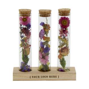 These dried flowers that fit through the mailbox offer a unique and sustainable gift. Dried flowers add a touch of natural beauty to any space. They remain beautiful for a long time and require no special care, making them perfect for both home and office. With their natural appearance, they bring a relaxed atmosphere that helps reduce stress and stimulate creativity. A perfect item to shine on your relation's desk.<br /><br />This dried flower set is fully customizable, both in color and with the addition of a logo or slogan. The tubes can be filled with colored dried flowers that match your company's branding. In addition to the special option of personalizing the dried flowers in color, the wooden stand also offers space for a logo or slogan. This strengthens brand recognition and shows appreciation for the relationship.<br /><br />If you have any questions about this product, desired personalization, or packaging options, please feel free to contact us.<br />Flowers and plants are living items and need to be transported with care to ensure their quality. As a result, transport costs are subject to individual arrangements. Please feel free to contact us regarding this matter.