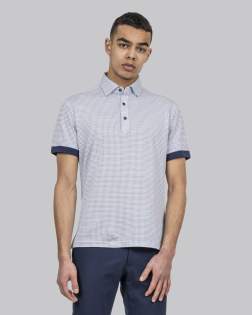 LIMITED EDITION<br />Polo pique is an essential garment in the summer wardrobe. We made a very limited stylish printed edition in a lightweight knitted pique fabric made out of exclusive long staple compact cotton. The classical shirt collar hints of formality, and it makes u looking your best at home office, along the poolside or at the summer- dinner party. <br /><br />Wear it alone or under a blazer, either way it will suit the occasion well.