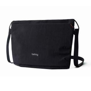 The ultimate in slim carry, this minimalist lightweight crossbody keeps your pockets free around town, or while travelling. Durable ripstop is 3x lighter than our other fabric. Can be folded or rolled, and packed for travel. Expandable storage. Front zip compartment with built-in key clip. Surprisingly spacious main compartment. Two slip pockets for small items. Lightweight adjustable strap. The ultimate in slim carry, this minimalist lightweight crossbody keeps your pockets free around town, or while travelling. Durable ripstop is 3x lighter than our other fabric. Can be folded or rolled, and packed for travel. Expandable storage. Front zip compartment with built-in key clip. Surprisingly spacious main compartment. Two slip pockets for small items. Lightweight adjustable strap.