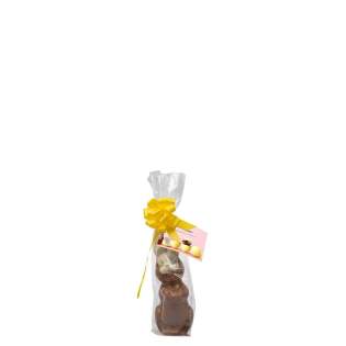 Melkchocolade paashaas ca. 200 gram voorzien van een strik in assorti kleuren en een dubbelzijdig full colour bedrukt kaartje Melkchocolade paashaas ca. 200 gram voorzien van een strik in assorti kleuren en een dubbelzijdig full colour bedrukt kaartje