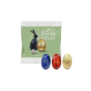 Lindor mini chocolade paaseitjes in een papieren zakje voorzien van een fullcolur bedrukking. Geleverd in een mix van melk, wit en puur Lindor mini chocolade paaseitjes in een papieren zakje voorzien van een fullcolur bedrukking. Geleverd in een mix van melk, wit en puur