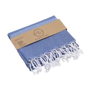 A multifunctional hammam towel from Oxious. Made from 50% Oekotex certified cotton and 50% recycled industrial textile waste (140 g/m²). Vibe is a wonderfully soft and stylish cloth with a cool stripe pattern. Beautiful as a shawl, dress on the couch, luxurious (hammam) cloth or towel. The cloth is handmade. Vibe symbolizes relaxation in a cozy atmosphere and environment.
These beautiful, soft cloths are made by local women in a small village in Turkey. They work there in a social context, with room for growth and development. The cloths are handmade with love and care for the environment. Pure enjoyment can begin with a product from the Oxious collection. Optional: Each item supplied in a kraft cardboard envelope and/or with a kraft sleeve.