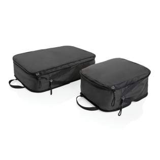 A set of 2 packing cubes made with 100% RPET that can expand and compress to optimise packing space helping you pack more efficiently and stay organised. The small cube measures L25*W18*H10 cm with a volume of 4.5L. The large cube measures L36*W25*10 cm with a volume of 9L. Flat size 3cm and expanding up to 10cm. With AWARE™ tracer that validates the genuine use of recycled polyester.<br /><br />PVC free: true