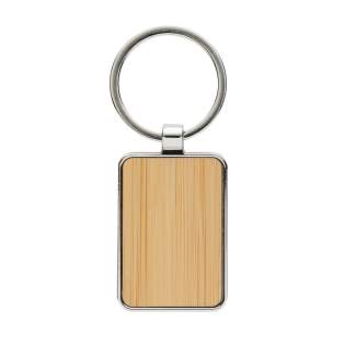 Ronde sleutelhanger gemaakt van RCS-gerecycled zinc alloy en bamboe. Totaal gerecycled materiaal: 76 % op basis van het totale gewicht van het item. RCS-certificering zorgt voor een volledig gecertificeerde toeleveringsketen van de gerecyclede materialen. Verpakt in papieren zak. Ronde sleutelhanger gemaakt van RCS-gerecycled zinc alloy en bamboe. Totaal gerecycled materiaal: 76 % op basis van het totale gewicht van het item. RCS-certificering zorgt voor een volledig gecertificeerde toeleveringsketen van de gerecyclede materialen. Verpakt in papieren zak.