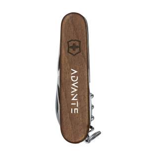 Original Swiss pocket knife by Victorinox with walnut wood handle. This wood comes from fallen branches and fallen trees. Each knife is unique thanks to the natural grain of the wood. The hard anodized aluminium intermediate plates and tools are made from 100% recycled steel. 7-piece with 10 functions: large knife, small knife, corkscrew, can opener with small screwdriver, bottle opener with large screwdriver, wire stripper, reamer with punch and sewing awl, and key ring. Includes instruction manual and lifetime warranty on material and manufacturing defects. Victorinox knives are a worldwide symbol for reliability, functionality and perfection. Please note local rules may apply regarding the possession and/or carrying of knives or multitools in public. Each item is individually boxed.