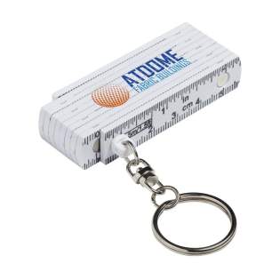 Mini mètre en fibre de verre solide attaché à un porte-clés, d'une longueur de 0,5 mètre/20 pouces. Calibré selon les normes européennes. Mini mètre en fibre de verre solide attaché à un porte-clés, d'une longueur de 0,5 mètre/20 pouces. Calibré selon les normes européennes.