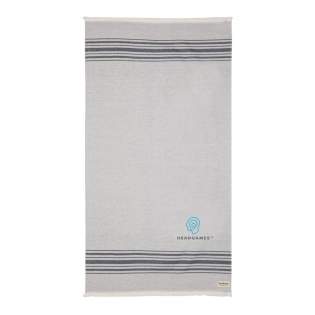 This lightweight, highly absorbent, sand-resistant, and quick dry towel is one of the best sustainable towels out there. Hammam towels are multifunctional: you can also use it as a picnic, baby blanket or as a yoga, beach, and gym towel. Even as a table cloth. Best of all, the thin material makes it ultra-portable and easy to toss in your beach bag, suitcase or over your shoulder. This towel contains 12% recycled cotton and is super soft and silky to the touch. With AWARE™ tracer that validates the genuine use of recycled cotton.  Each towel saves 597,8 litres of water. 2% of proceeds of each Impact product sold will be donated to Water.org. Made in Portugal. OEKO-TEX® STANDARD 100. 2306129 Centexbel.