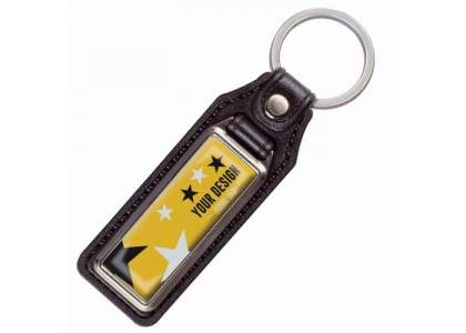 A metal rectangular keyring with a single sided doming on leather tag.