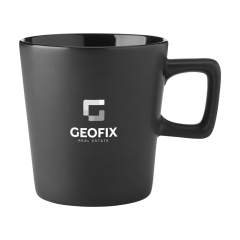 Modern mug made from high-quality ceramic and 5% recycled ceramic. The handle has an angular shape, creating an eye-catching design feature. The outside of the mug has a chic matte finish, the inside is finished in high gloss. Dishwasher-safe. Capacity 290 ml. NOTE: The white mug cannot be laser engraved because it is not sufficiently visible. Recycled ceramic mugs are manufactured by mixing raw materials with fragments of broken or unusable mugs collected in the same factory. These discarded components are finely ground into powder and then mixed with essential substances such as kaolin and quartz before being converted into new ceramic products. The final product usually consists of 5% to 10% recycled ceramics to ensure optimal quality. The use of recycled ceramics promotes the circular economy and reduces the need for new raw materials. Modern mug made from high-quality ceramic and 5% recycled ceramic. The handle has an angular shape, creating an eye-catching design feature. The outside of the mug has a chic matte finish, the inside is finished in high gloss. Dishwasher-safe. Capacity 290 ml. NOTE: The white mug cannot be laser engraved because it is not sufficiently visible. Recycled ceramic mugs are manufactured by mixing raw materials with fragments of broken or unusable mugs collected in the same factory. These discarded components are finely ground into powder and then mixed with essential substances such as kaolin and quartz before being converted into new ceramic products. The final product usually consists of 5% to 10% recycled ceramics to ensure optimal quality. The use of recycled ceramics promotes the circular economy and reduces the need for new raw materials.