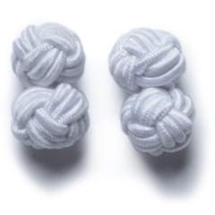 All of our shirts come with an extra buttonhole in the cuff, so if you prefer you can wear a set of our classic double knot on bar cufflinks.  Their hand-made from soft stretch band, and comes in a big variety of colors.