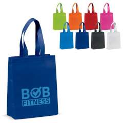 Non-woven bag in various colours. Matt laminated. The handles are made of non-woven material. Ideal for groceries or a day at the beach. Also appropriate for business conferences.