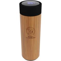 Double-walled vacuum insulated stainless steel and bamboo bottle with a temperature sensor on top of the lid, which displays the temperature of the drink inside the bottle (degrees Celsius). Keeps drinks hot for 8 hours or cold for 12 hours. Comes with a tea filter. Capacity: 500 ml. Delivered in a gift box. 