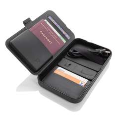 Hard shell travel case with integrated 3-in-1 wireless charger made with RCS recycled PU Total recycled content: 5% based on total item weight. RCS certification ensures a completely certified supply chain of the recycled materials. The travel case has storage space for passport, multiple cards and has an integrated cable holder. The travel case comes equipped with a magnetic 15W wireless charger and an additional 5W wireless charger suitable for earbuds cases or other small wireless chargeable devices and a 2.5W wireless charger for smartwatches ( Apple watches only). Perfect to carry all your valuables and charge all your devices. Inside is also a small magnetic wallet that can be taken out. Including 120 cm TPE cable. Packed in FSC® mix packaging. Item and accessories 100% PVC free. Minimum Input: 9V/3A for optimal use. Output: Phone: 9V/1.1A; 9V/1.67 A/(15W), Earbuds: 5V/1A (5W), Watch: 5V/0.5A.<br /><br />WirelessCharging: true<br />PVC free: true