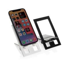 Flat and foldable phone stand made from RCS recycled ABS.  The stand comes flat and folded and can be unfolded into a phone stand that can carry all size phones. The stand is strong enough to adjust the viewing angle. With silicon cushioning to keep ...