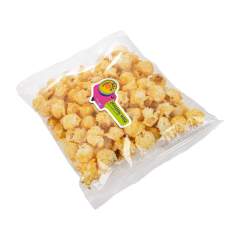 Vierkant zakje popcorn met een full colour sticker in eigen vorm op de voorzijde, ca. 30 gr zoete popcorn of 18 gr zoute popcorn.