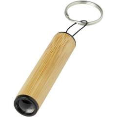 The Cane bamboo key ring with light is a compact and versatile accessory designed to provide you with convenient illumination whenever you need it. Just pull the polyester string to shine your light. The key ring can easily be attached keys, backpack, or any other personal belongings. The body is made of durable ABS material, ensuring long-lasting performance, and the outer case is crafted from bamboo, adding a touch of natural beauty to its design. Delivered with 3 LR41 batteries. Light capacity: 1.5V/30mAh. 