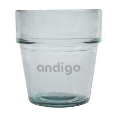 WoW! Rustic water glass. Made of 100% recycled, robust quality glass. A stackable design for easy and space-saving storage.    The blue-green tint of this glass is a natural result of the recycling process. The colour and any imperfections emphasise the beauty of this recycled product and contributes to its authenticity.     Recycling reduces the consumption of new raw materials, water and energy. Colour, thickness and size may vary by product. Made in Spain. Capacity 270 ml.