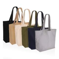 The Impact AWARE™ 240gsm recycled canvas shopper with pocket undyed is the perfect way to carry your essentials wherever you go. This spacious shopper provides sufficient space for all your daily needs. Including a small inner pocket. The recycled ca...