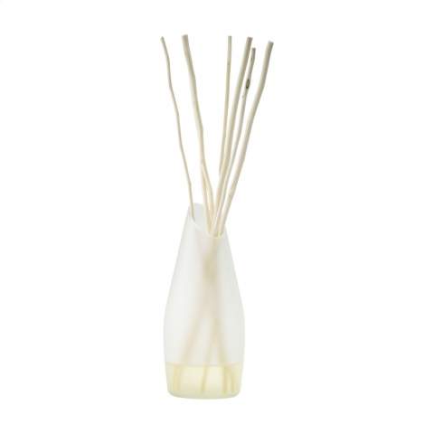 The Spiritual Spa Diffuser from the 'We Love The Planet' brand consists of several different 100% essential oils, that when mixed together, provide the most intense fragrance experience. Spiritual Spa is a popular fragrance. This relaxing and refreshing fragrance oil has a neutralising effect that combines eucalyptus, mint, lavender and rosemary, tea tree and basil. Having this scent in your home replicates the sense of being in a sauna. With just 2-3 sticks, these diffusers can last between 16 and 20 weeks with normal use. This set consists of a bottle with a capacity of 200 ml of fragrance oil, a vase made from recycled glass (height 16 cm) and 2 bunches of large kajute sticks. The oil contains no synthetic fragrances, alcohol or solvents. Each set is supplied in a recycled kraft gift box with a sleeve.  The wooden fragrance sticks are made from washed and dried reed, called Sida Rhombifolia Linn. These kajute sticks are picked by hand, and they grow like weeds in the wild. These sticks are extremely important in the scent experience. Due to being hollow inside, they load and disperse the scent far better than 'normal' fragrance sticks.
