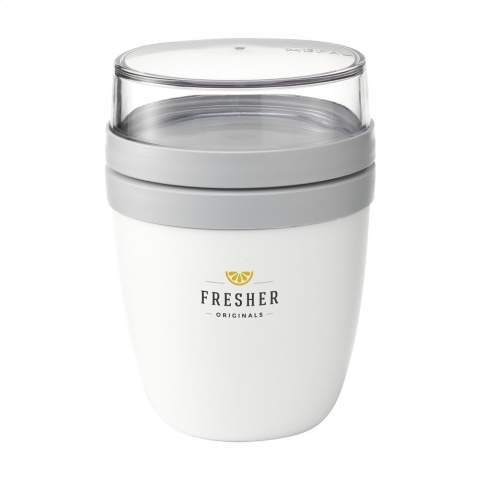 This plastic food jar made by Mepal is a handy product for transporting your lunch or snack. The food jar has two compartments. You can separate the two with a twisting motion. Both parts have a separate lid. The ideal solution for preventing spills while mixing. The volume of the upper transparent compartment is 200 ml, which means that it holds about 75 grams of muesli or fruit. The volume of the bottom compartment is 500 ml, enough for a generous portion of soup, noodles or yoghurt. A premium high-quality product. BPA-free, Food Approved and leak-proof. Microwave safe (except lid) and freezer safe. Comes with a 2-year Mepal manufacturer's warranty. Made in Holland.   STOCK AVAILABILITY: Up to 1000 pcs accessible within 10 working days plus standard lead-time. Subject to availability.