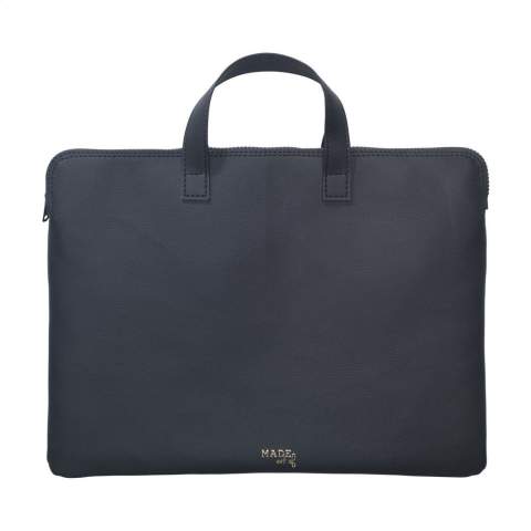 With a luxurious, design, this 15-16-inch laptop bag from the MADE out of brand, made from vegan leather. The vegan leather is a plant-based alternative to leather and made from recycled apple pulp. It has the look and feel of real leather. The waste from the apples is processed and then combined with a mix of PU, polyester and cotton. This laptop bag has a YKK zipper, 2 handles and a front pocket. The spacious main compartment is neatly finished with a 100% recycled PET lining, and offers enough space for a charger, documents and a notepad. Suitable for storing and safely transporting a laptop up to 16-inches. Keep everything in one place, even when you are on the go. This top product is handmade. Dutch design. Made in Holland.