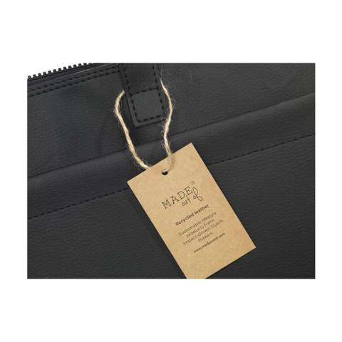 With a luxurious, design, this 15-16-inch laptop bag from the MADE out of brand, made from vegan leather. The vegan leather is a plant-based alternative to leather and made from recycled apple pulp. It has the look and feel of real leather. The waste from the apples is processed and then combined with a mix of PU, polyester and cotton. This laptop bag has a YKK zipper, 2 handles and a front pocket. The spacious main compartment is neatly finished with a 100% recycled PET lining, and offers enough space for a charger, documents and a notepad. Suitable for storing and safely transporting a laptop up to 16-inches. Keep everything in one place, even when you are on the go. This top product is handmade. Dutch design. Made in Holland.