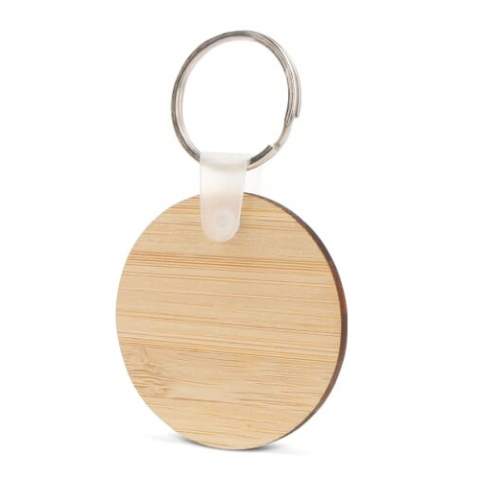 Introducing our Bamboo Round Keyring - a perfect blend of style and sustainability. Crafted from eco-friendly bamboo, this sleek and durable keyring adds a touch of nature to your daily essentials.