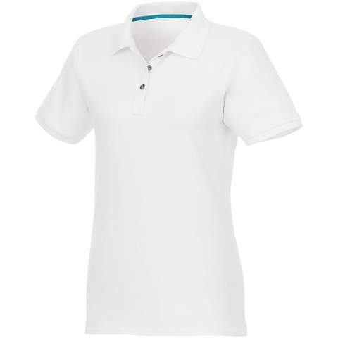 The Beryl short sleeve women's polo is made of 220 g/m² 70% GOTS certified cotton blended with 30% GRS certified recycled polyester, making it a more sustainable option suitable for a variety of occasions and activities. Adding to its sustainability, the polo features GRS certified buttons, further reducing its environmental impact. The flat knit rib cuffs add sophistication and the polo is designed with a fitted shape for a feminine look. GOTS certification ensures a 100% certified supply chain from raw material to our printing techniques, making this garment an eco-friendly choice.