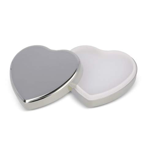 Lip balm in a heart-shaped container made from recycled ABS. Provides moisturizing care in a stylish and compact design. Eco-friendly and perfect for everyday use.