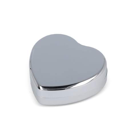 Lip balm in a heart-shaped container made from recycled ABS. Provides moisturizing care in a stylish and compact design. Eco-friendly and perfect for everyday use.