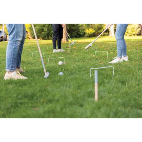 Beautifully crafted 4 player wooden croquet set that includes 4 croquet hammers, 4 balls and 10 metal hoops. Simply place the hoops in a prefered position and make two teams. One team plays 2 designated balls and the other team play the other 2. If one team succeeds to hit the ball through a hoop they get another strike. If not:  it’s the other team turn. The winner is the team who manages to score all hoops with both balls.  Hammer head and balls are made from Pine wood and handle and pins from Eucalyptus wood. Presented in a cotton pouch with rule book.