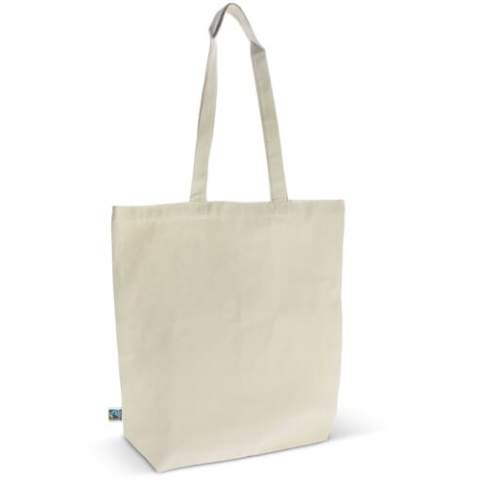 Go green with our Fairtrade cotton bag.Not only is it spacious and sturdy for your needs, but it also supports ethical production practices. Carry your essentials responsibly in style!