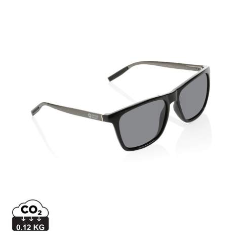 Luxury polarised sunglasses made with RCS certified recycled PC frame and aluminum temples. Total recycled content: 37% based on total item weight. RCS certification ensures a completely certified supply chain of the recycled materials. Including GRS certified recycled RPET sleeve to store the glasses in.The lenses are polarised which eliminates reflecting sunlight, making it ideal for driving a car or during other sunny summer or winter outdoor activities. Conform EN ISO 12312-1, UV 400 and CAT 3. Packed in a FSC® gift packaging.
