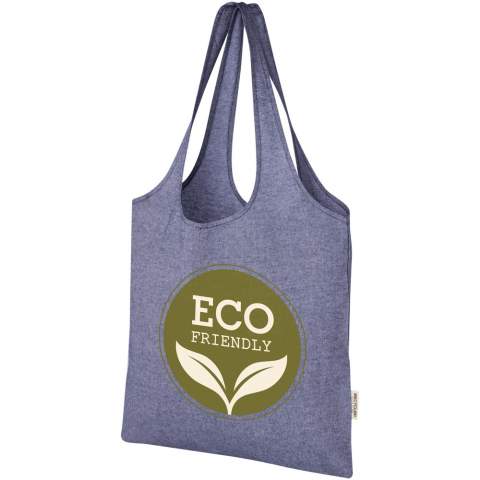 150 g/m² shopping tote bag with a trendy design featuring an open main compartment with 25 cm long handles. Made of recycled cotton and completely reusable, making it a great alternative to plastic bags. Resistance up to 5 kg weight. There may be minor variations in the colour of the actual product due to the nature of the production process.