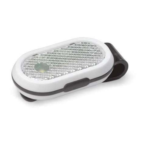 Une lampe facile à fixer sur les vêtements et les sacs. Avec une lumière rouge et blanche. Pratique lorsque vous voulez être vu en faisant du sport la nuit.