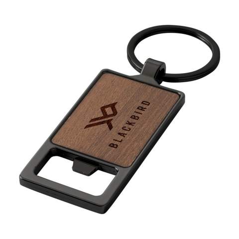 Porte-clés avec décapsuleur. Avec un manche en bois dur et un ouvre-porte en alliage de zinc. Attaché à un porte-clés en métal robuste. Chaque article est  fourni dans une enveloppe individuelle en papier kraft marron.