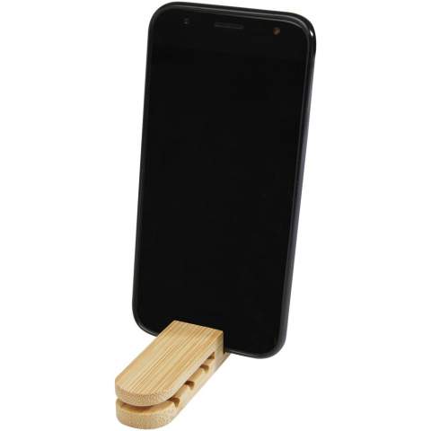 Bamboo cable manager to keep cables neat and organized. It also functions as a phone stand, making it the perfect desk accessory. Size: 90 x 24 x 18 mm. Delivered in a gift box made of sustainable material.