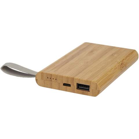 Bamboo power bank that provides 5000 mAh of back-up power for  mobile phones or other digital devices. It features LED indicator lights and a webbing made of RPET material. Packaged in a gift box and delivered with an instruction manual (both made of sustainable material). Micro-USB charging cable is included. Since bamboo is a natural product, there may be slight variations in colour and size per item, which may affect the final decoration outcome.
