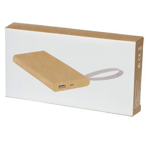 Bamboo power bank that provides 5000 mAh of back-up power for  mobile phones or other digital devices. It features LED indicator lights and a webbing made of RPET material. Packaged in a gift box and delivered with an instruction manual (both made of sustainable material). Micro-USB charging cable is included. Since bamboo is a natural product, there may be slight variations in colour and size per item, which may affect the final decoration outcome.
