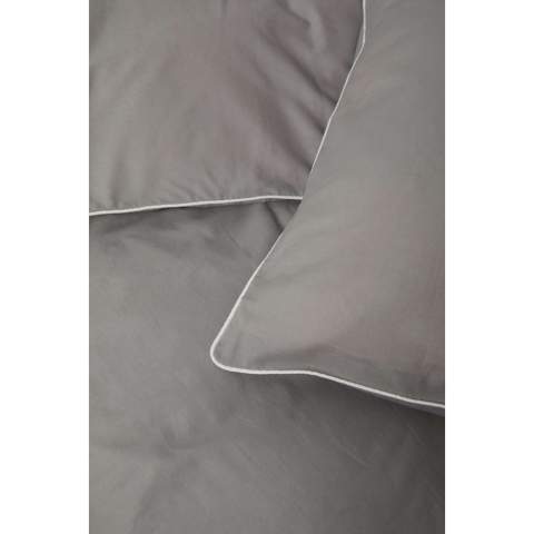 This elegant set features a solid colour design with piping detail in contrasting colour along the edges, adding a touch of sophistication to your bedding ensemble. Complete with two pillowcases (50x60 cm) and two duvet covers (150x210 cm), it ensures a coordinated and chic look for your bed. The Organic Content Standard (OCS) verifies organically grown material and tracks it from source to final product. This product contains 98% OCS certified organic cotton.