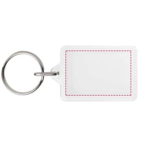 Porte-clés transparent Y1 rectangulaire avec anneau fendu en métal. L’anneau en forme de boucle métallique présente un profil plat idéal pour les envois. Dimensions de l’insert pour impression : 3,5 cm x 2,4 cm.