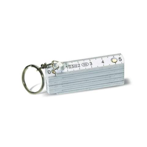 Foldable white mini ruler on a keyring. Length of 0.5 meters.